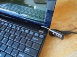 Netbook with padlock. Image courtesy of fboyd at Flickr http://www.flickr.com/photos/fboyd/4123050832/